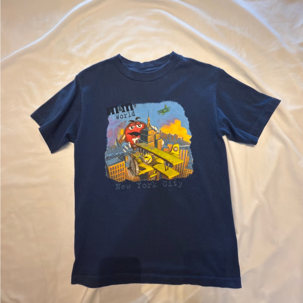 M&M world T-shirt, size unknown ￼